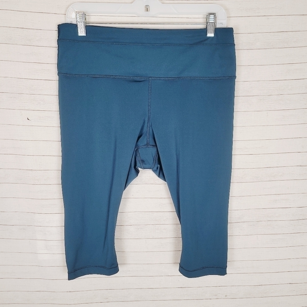 ATHLETA ACCELERATE CROP LEGGINGS IN TEAL GREEN, SZ XL